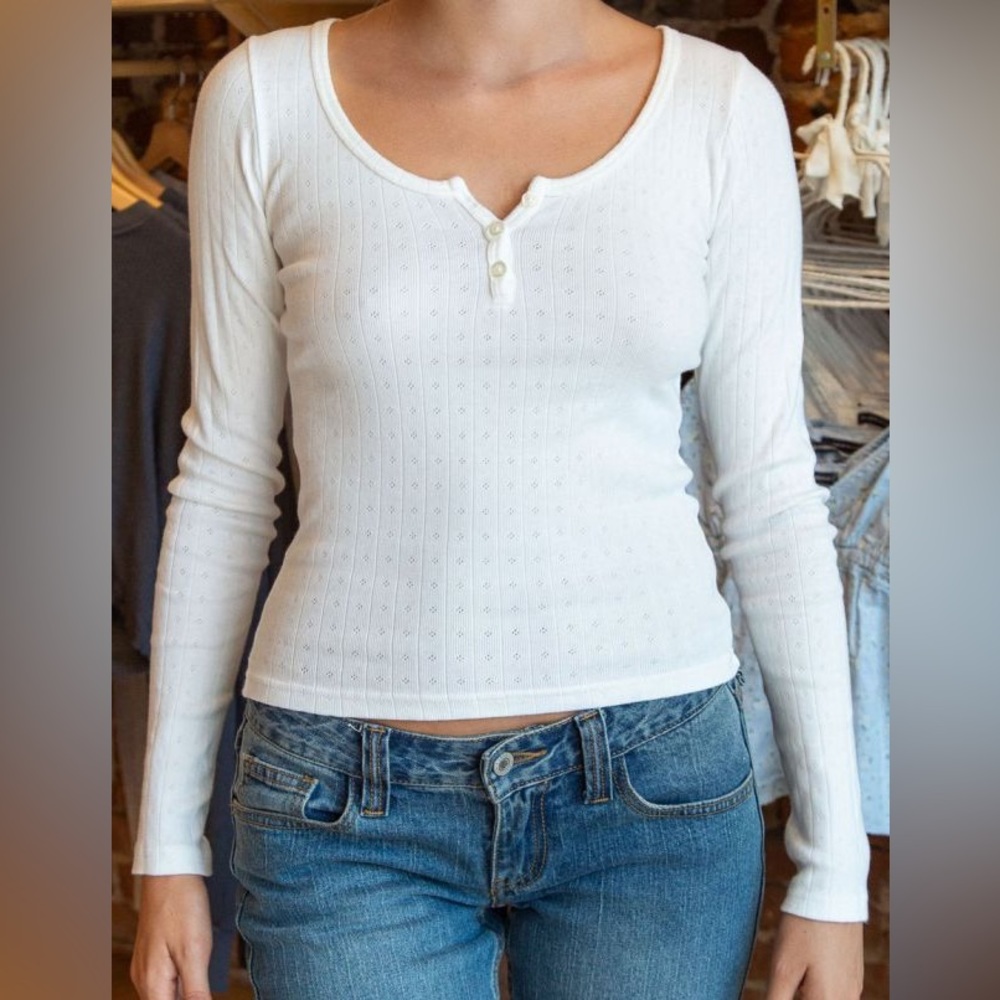 Brandy Melville Zelly eyelet long sleeve top. In excellent used condition